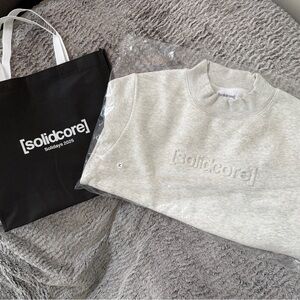 [solidcore] Solidays 2025 Crewneck Sweatshirt & Tote